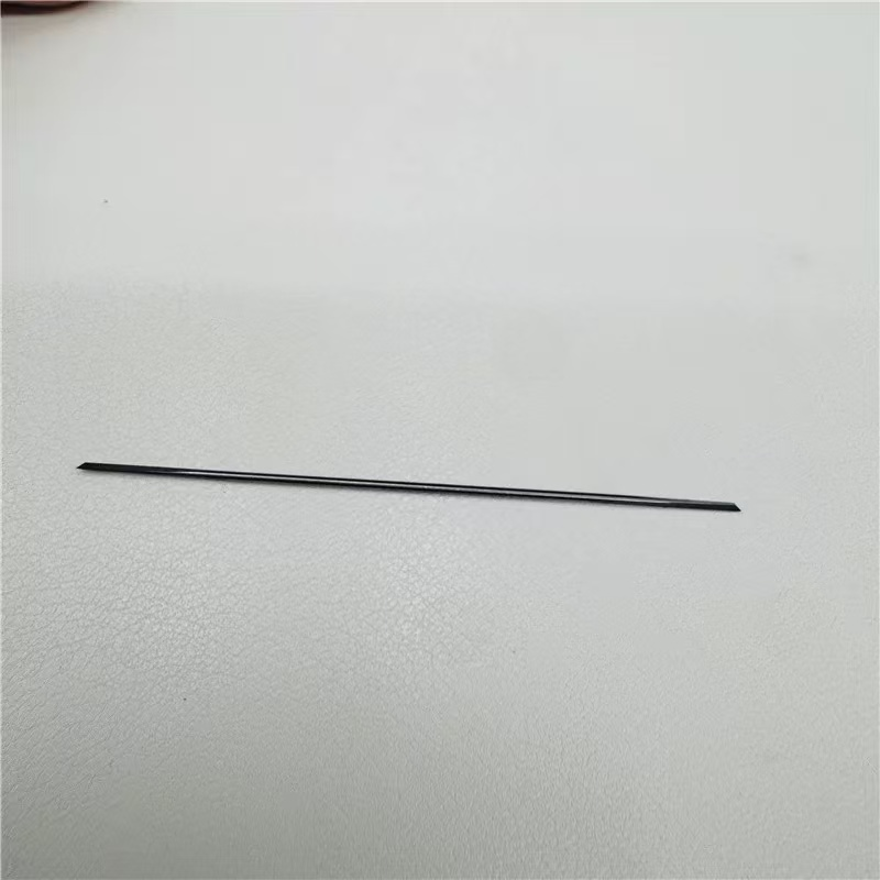 double-ended tungsten pearl drilling needle close-up