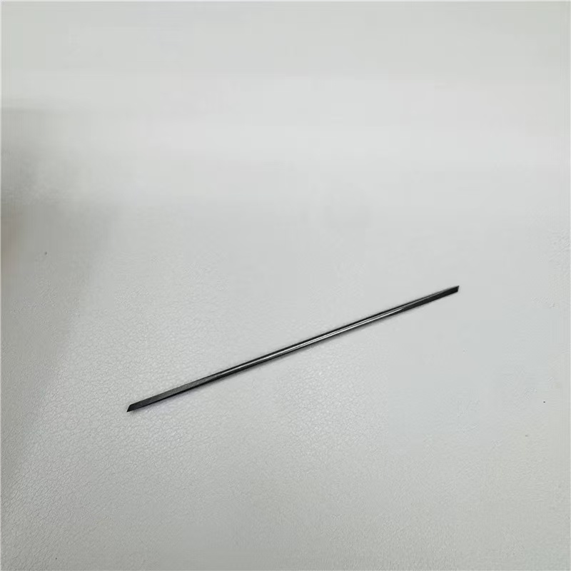 double-ended tungsten pearl drilling needle close-up