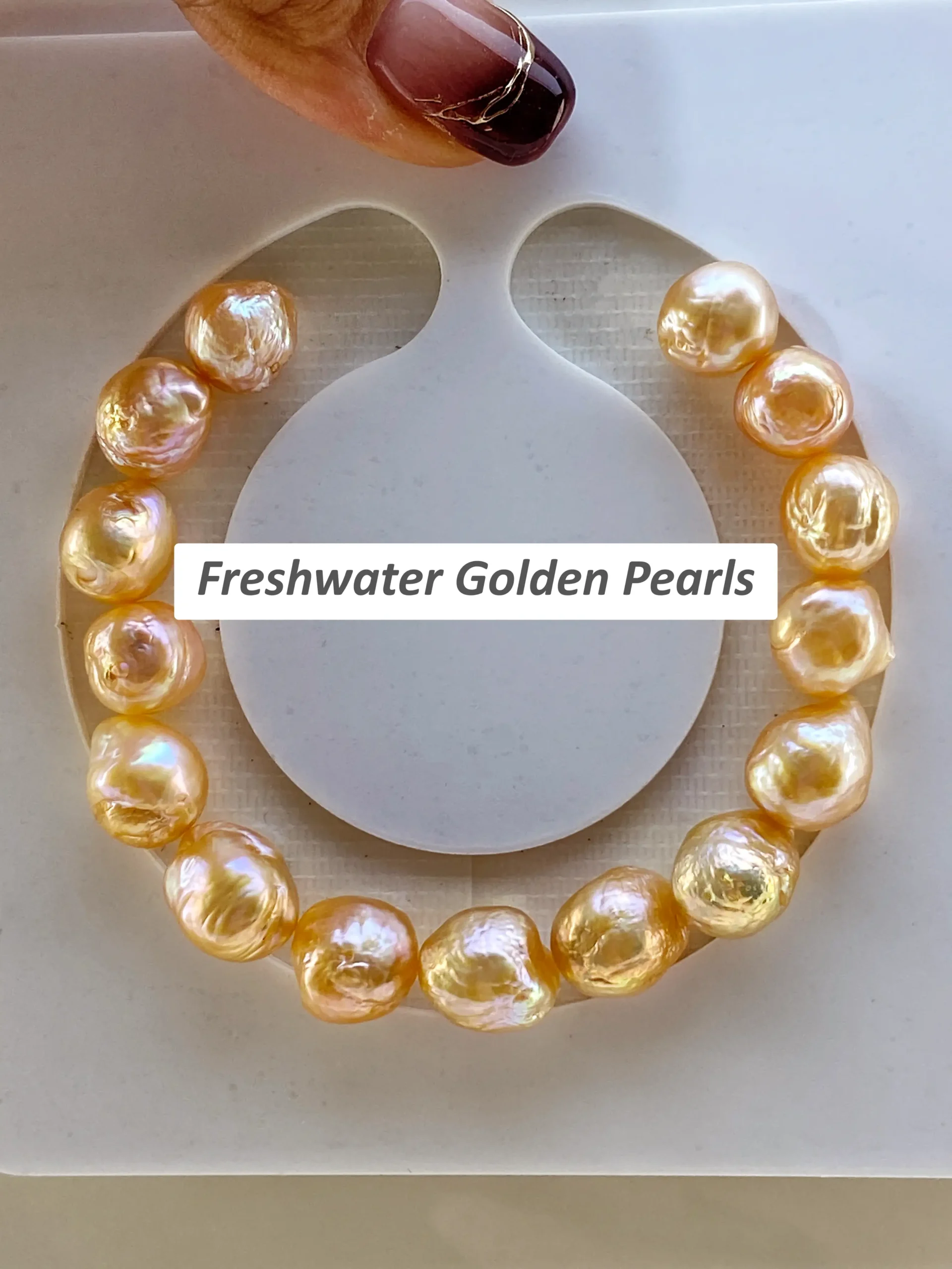 Freshwater peach-gold pearls