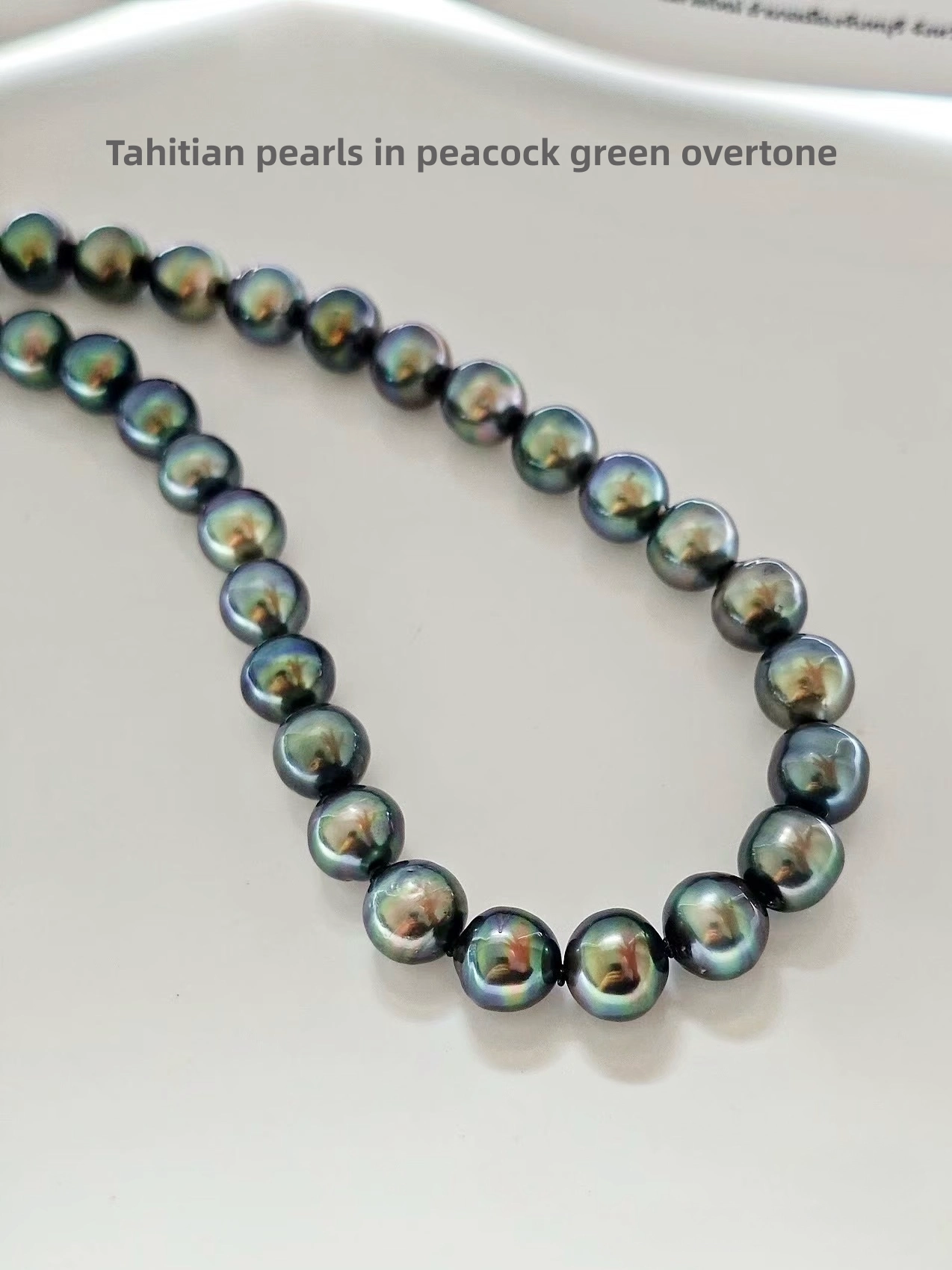 Tahitian pearls in peacock green overtone
