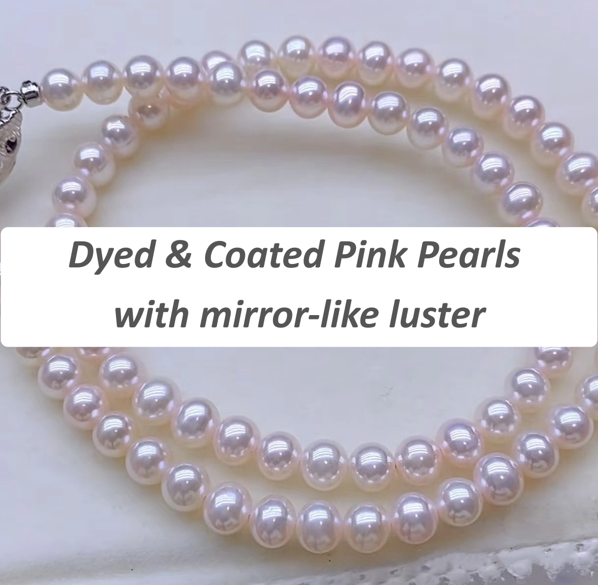 Strand of dyed and coated pink pearls with unreal luster