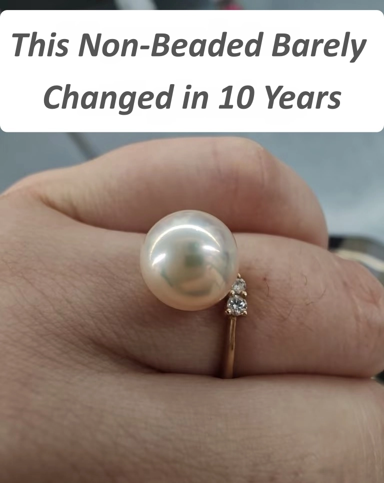 Champagne freshwater non-beaded pearl ring showing stable color after 10 years