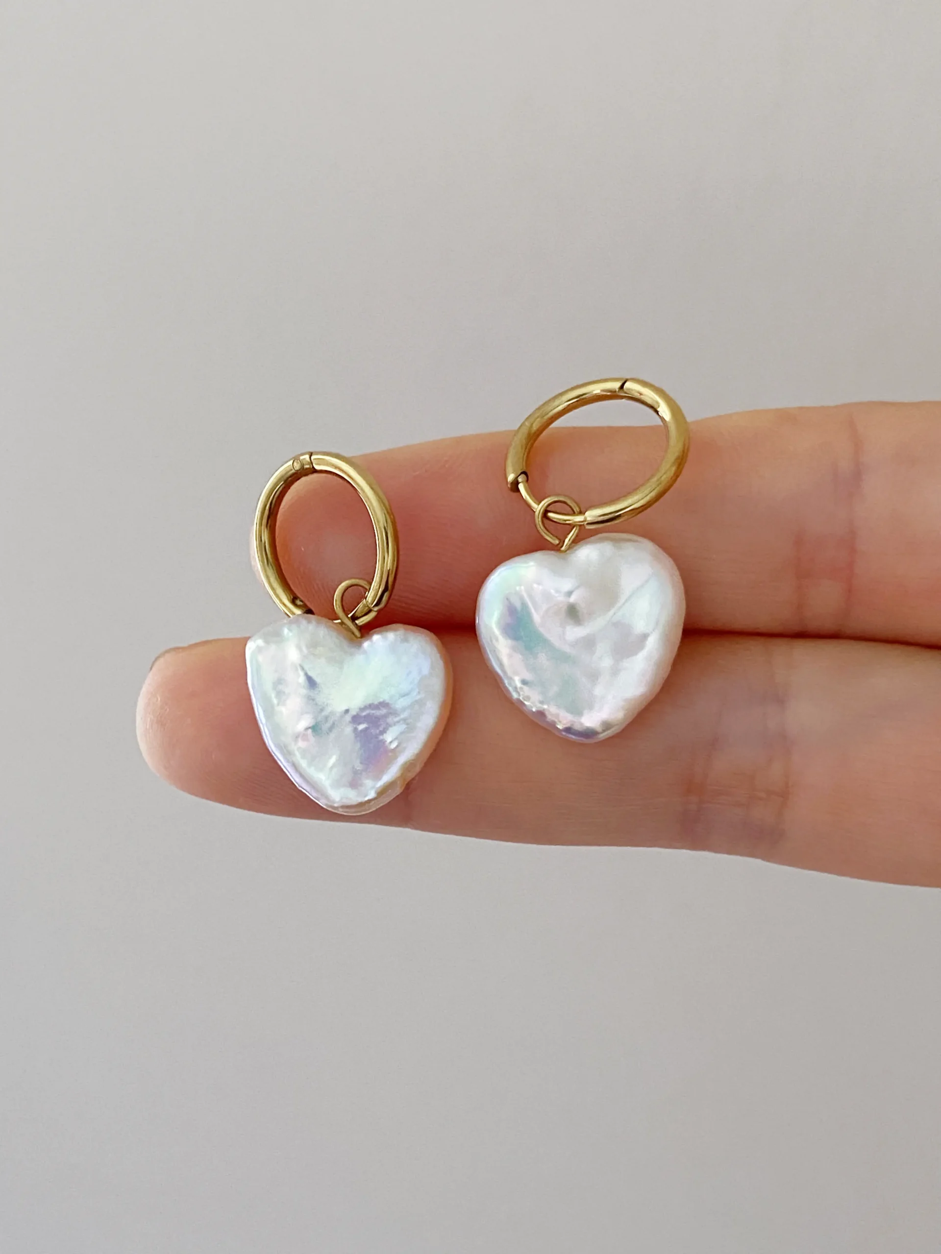 Natural heart-shaped freshwater pearl hoop earrings in gold
