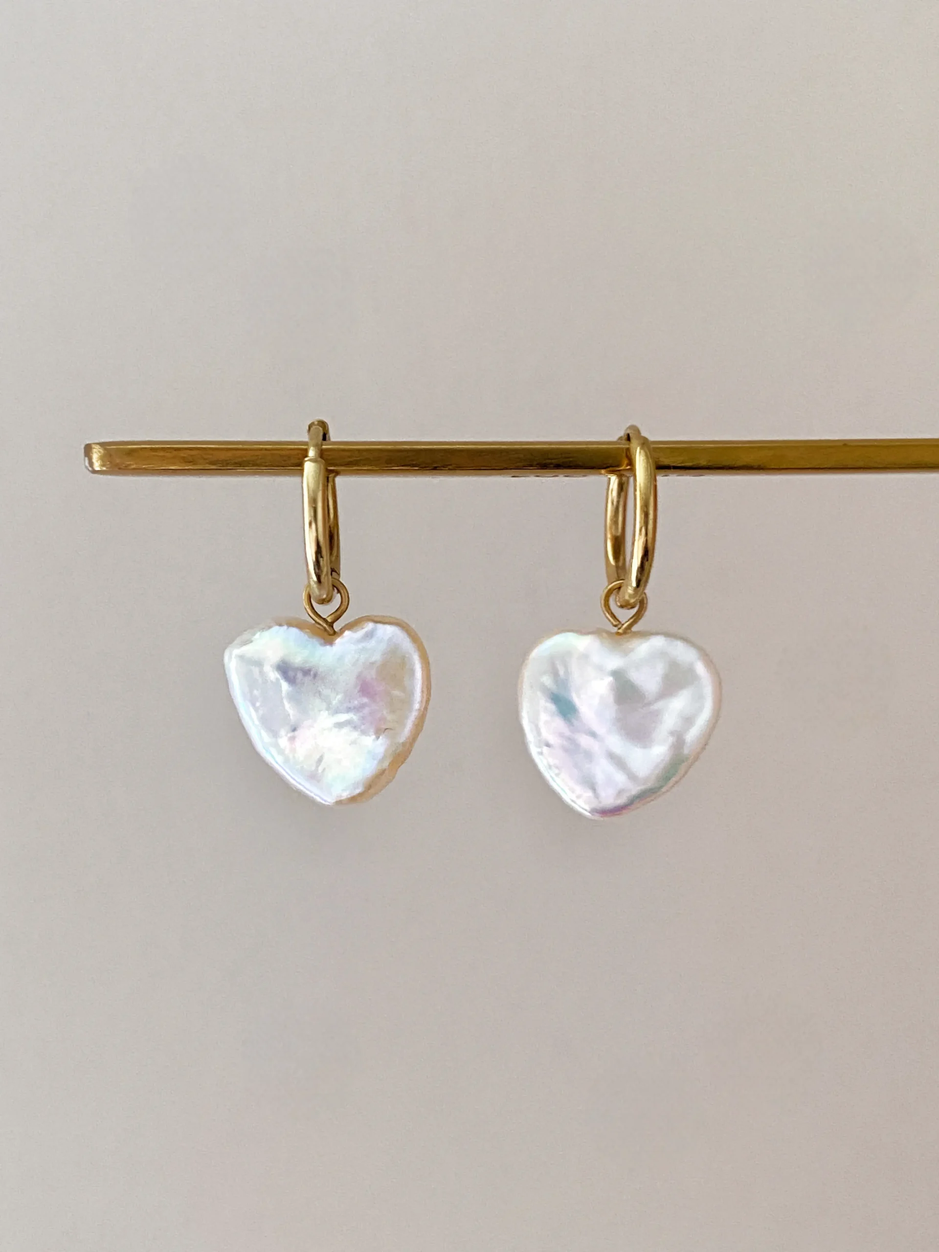Natural heart-shaped freshwater pearl hoop earrings in gold