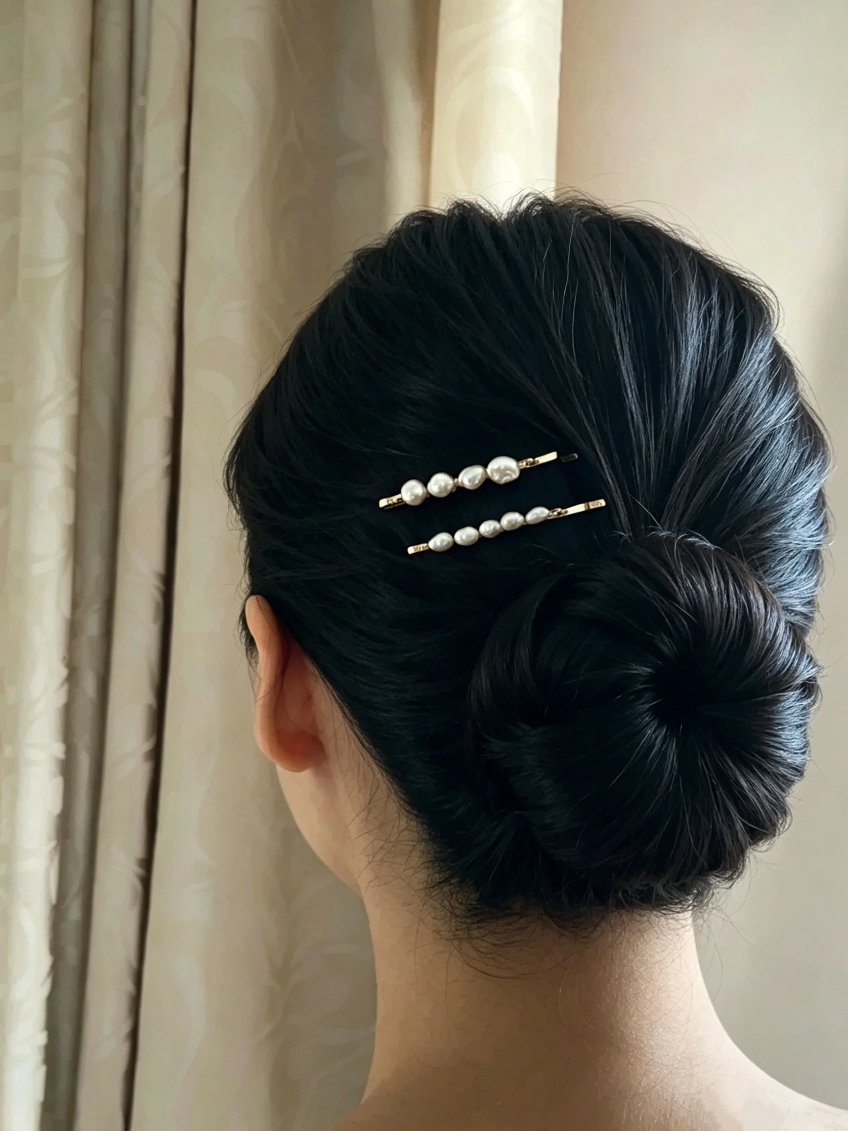 Woman wearing handmade real pearl hairpins with genuine freshwater pearls